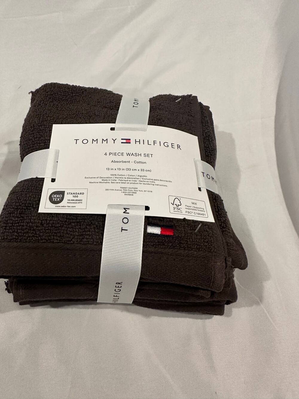 NWT Tommy Hilfiger four piece wash set 13” x 13” brown in color